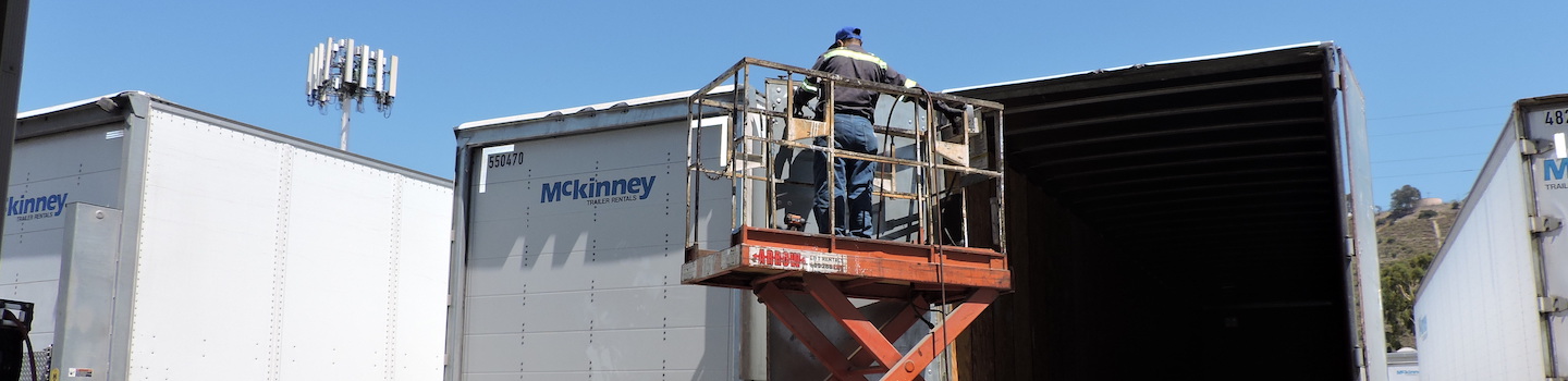 Mckinney maintenance tech servicing semi-trailer
