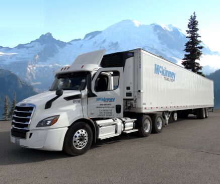A truck with Mckinney trail with Mt. Rainier in the background.